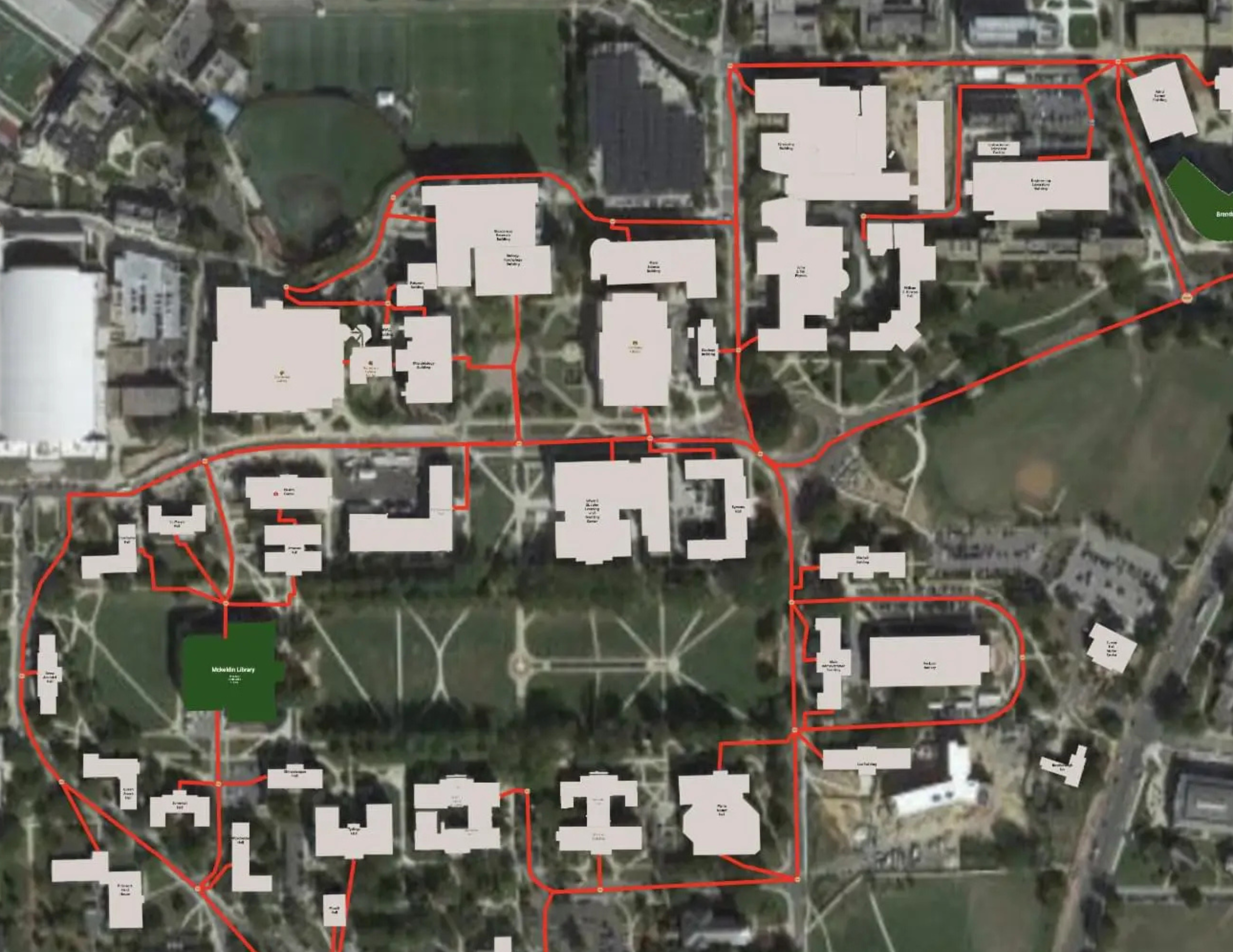 Fiber GIS map in netTerrain OSP showing satellite view with buildings and fiber routes